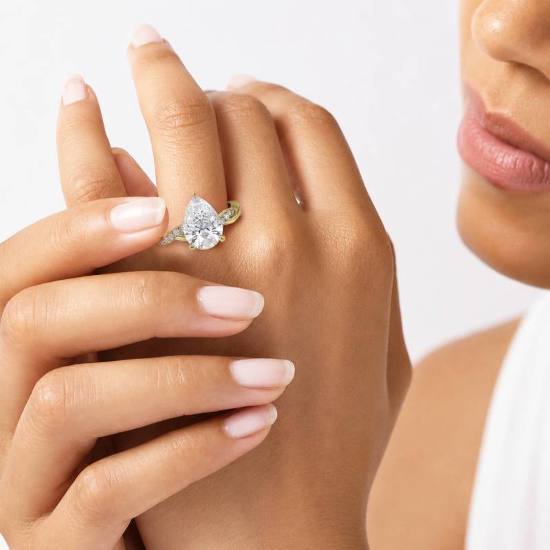 Infinity Twist Pear Diamond Engagement Ring