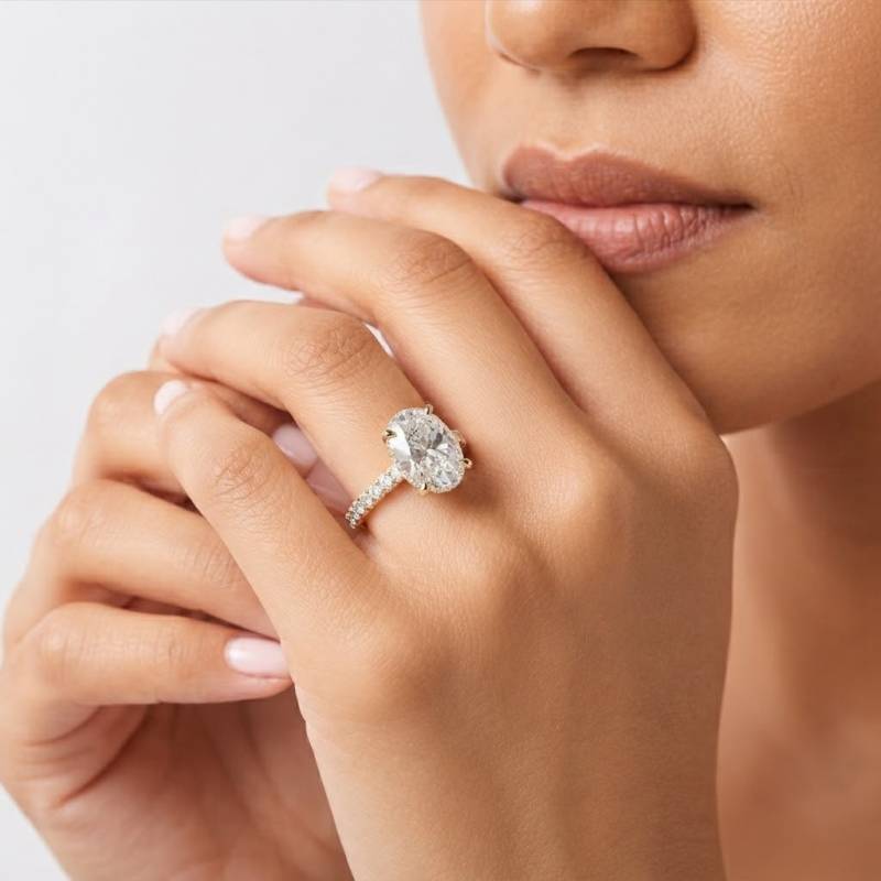 Oval Diamond Hidden Halo Shoulder Set Ring