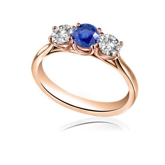 Modern Round Diamond and Blue Sapphire Trilogy Ring