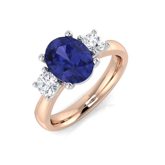 2.30ct VS/E-F Oval Tanzanite and Round Diamond Trilogy Ring