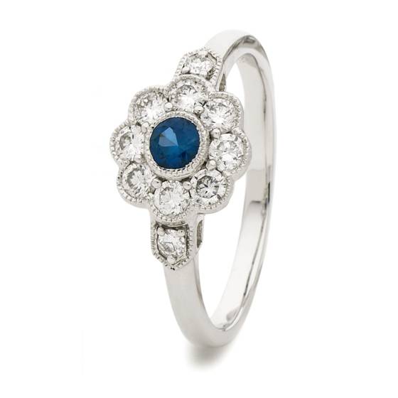 0.60ct Blue Sapphire and Diamond Halo Ring